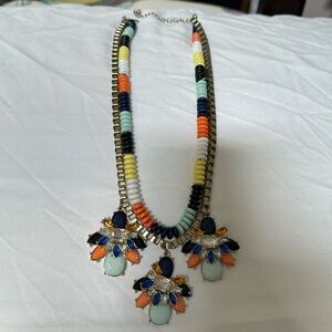 Gorgeous 18” necklace. Gold tone and bead strands are adorned with stones.